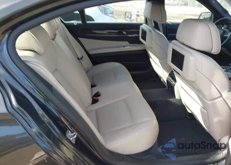 2011 BMW 750Li z USA, uszkodzony, nr VIN WBAKB8C54BCY66596